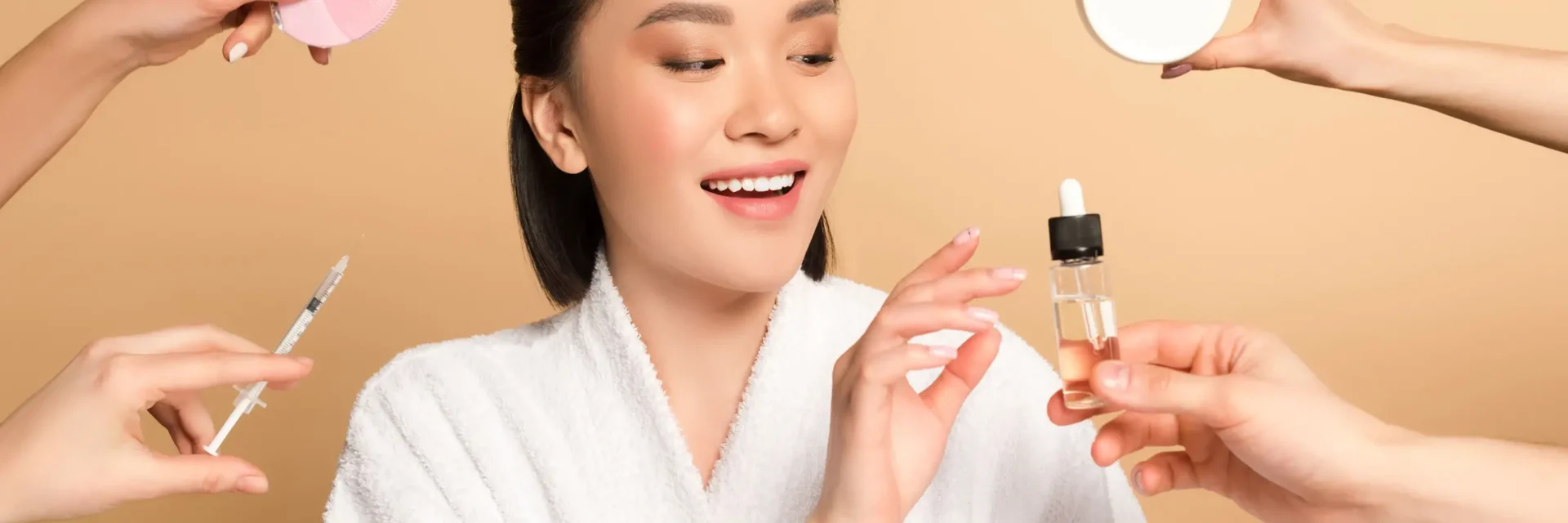 Smiling Asian woman simplifies skincare, chooses serum over multiple products for clear skin.