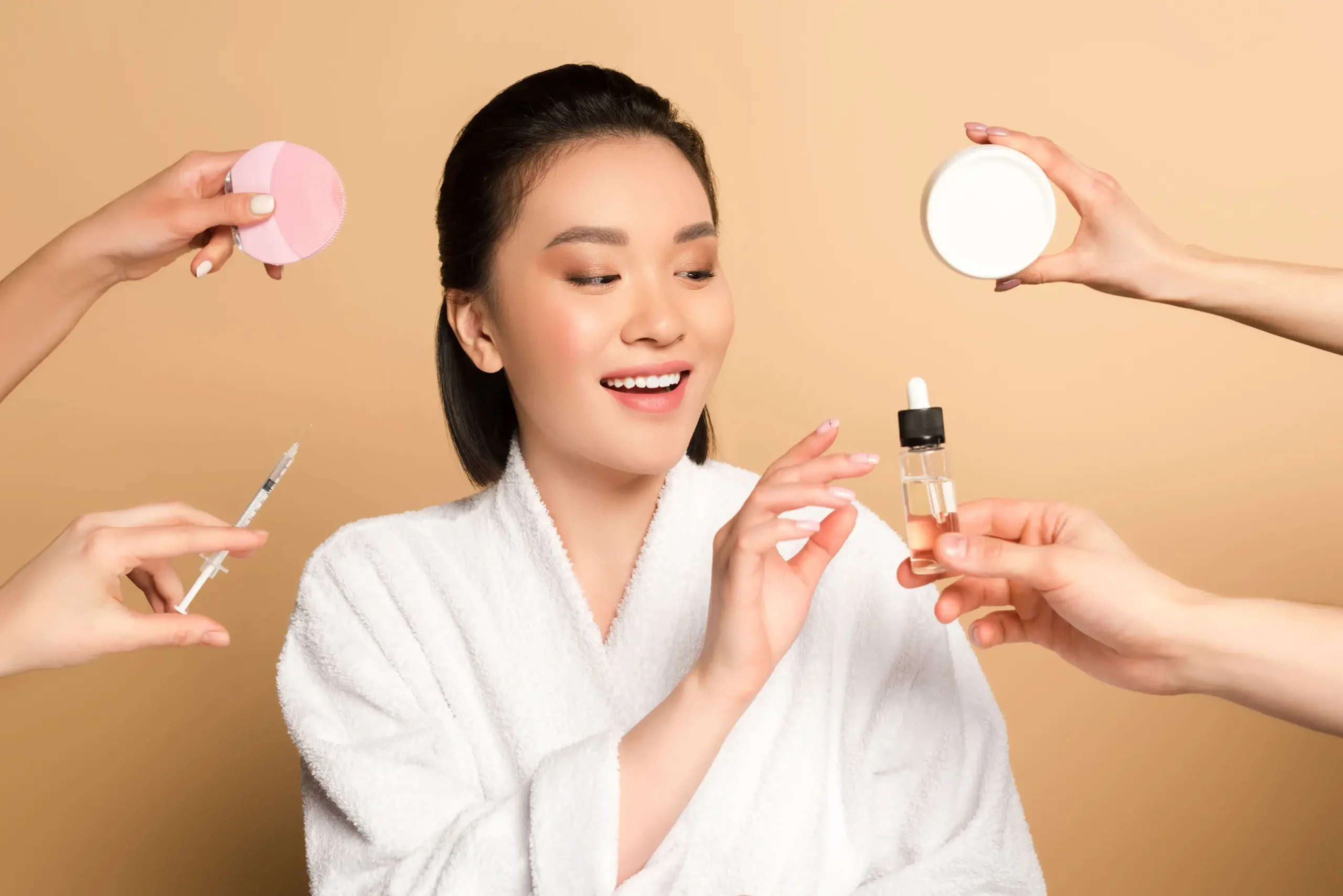 Smiling Asian woman simplifies skincare, chooses serum over multiple products for clear skin.